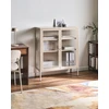 Beliani Spintelė su stiklinėmis durelėmis LERRYN Metal 90 cm smėlio spalvos