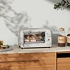 Elektrinė krosnelė HOMCOM mini orkaitė 10 litrų 750W maža elektrinė orkaitė su temperatūra iki 230 ℃, 60 minučių laikmačiu, kepimo skarda ir grotelėmis 36,5x26x22 cm, kreminė balta
