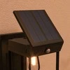 "Outsunny" saulės šviesos sieninis LED lauko apšvietimas sodo šviesa šilta balta reguliuojamas šviesos jutiklis IP44 sodo terasa juoda