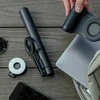Energea laikiklis fotografavimui su įmontuotu powerbank Magear Magcam Grip juodos spalvos MagSafe PG-MCG5K-BLK