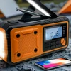 Feegar IPX3 AM/FM avarinis radijas su rankiniu švaistikliu, žibintuvėliu, išorine baterija ir saulės baterija