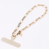 UNIQ Coehl GoldiLocks Handstrap universal phone strap for hand aukso spalvos/champagne aukso spalvos
