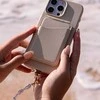 UNIQ Coehl Perla Handstrap universal phone strap for hand baltos spalvos/baltos spalvos pearl
