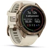 „Garmin fenix 9 Pro“ išmanusis laikrodis, 43 mm, titano, rudens aukso spalvos su kreminės spalvos / prancūziško pilko silikono dirželiu