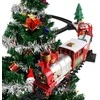 Kalėdinis traukinys ant eglutės su šviesomis ir Merry Christmas garsu