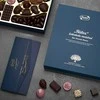Rūta Šokoladinių saldainių kolekcija „Rūtos“ šokolado meistrai. ŠIMTMEČIO ISTORIJA, 550 g