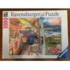 Ravensburger "2D" Dėlionė 1000 vnt. - Vaizdas iš namelio ant ratų
