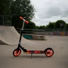 Juskys Paspirtukas Homestar Fire 88 cm juoda/raudona