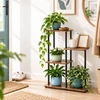 Relaxdays Kelių pakopų gėlių vazonų stovas iš metalo ir MDF, juodas rėmas, rudos lentynos