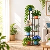 Relaxdays Kelių pakopų gėlių vazonų stovas iš metalo ir MDF, juodas rėmas, rudos lentynos