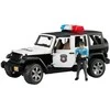 BRUDER policijos džipas Wrangler, su policininku ir priedais, 2526