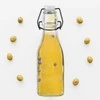 Apvalus stiklinis butelis su segtuku ir kamščiu alyvuogių aliejui, alkoholio sirupui, 0,29 l