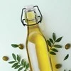 Apvalus stiklinis butelis su segtuku ir kamščiu alyvuogių aliejui, alkoholio sirupui, 0,29 l