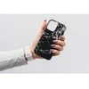 „iPhone 15 PRO Forcell F-Protect Mirage“ dėklas, suderinamas su „Magsafe Military Drop-Test“ juodo marmuro korpusu.