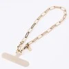 UNIQ Coehl GoldiLocks Handstrap universali virvelė skirta telefonui ant rankos aukso spalvos