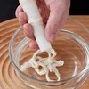 Dešrų , dešrelių ir panašių maisto produktų gaminimo įrankis