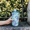 Quokka Mist - nerūdijančio plieno termo puodelis 720 ml su šiaudeliais (violetinė žydėjimas)