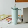 Quokka Stream – nerūdijančio plieno termo puodelis 950 ml su šiaudeliais (turkis)