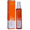 Clarins Glowing Sun Care Mist SPF 50+ dvifazė apsauginė purškiama dulksna nuo saulės, 150 ml