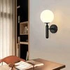 Pakabinamas šviestuvas Toolight Sieninė lempa G097-1W Juodas
