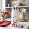 Termosas butelio formos su plačia anga, baltas su gėlių motyvu, 560 ml