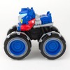 Tomy JOHN DEERE traktorius su šviečiančiais ratais Optimus Prime, 47423