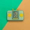 Elektroninių arkadinių žaidimų nešiojamoji konsolė žalia