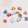 Woopie Žalias medinis vėrimo žaislas Transportas 13 vnt