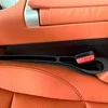 ATL Automobilio sėdynių tarpų užpildai(2 vnt.) – juodi, kairė + dešinė pusė