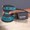 Makita BO5031K Ekscentrinis šlifuoklis, 300 W, 125 mm, 4000-12000 min-1, 2,8 mm, lagaminas, 1,3kg