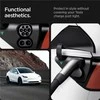 „Spigen Tesla“ įkrovimo prievado apsauginių plėvelių ir įvynioklių rinkinys (EU), anglies pluošto - Tesla Model Y/3