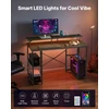 VEVOR 120 cm kompiuterio stalas su LED, maitinimo lizdais, apverčiamas žaidimų stalas su monitoriaus stovu, namų biuro darbo vieta, juodas stalas su lentynomis, modernūs baldai