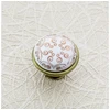 Porcelain knob 728-J4 antique brass C-Orient Gold