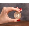 Bitcoin BTC plastikiniame dėkle