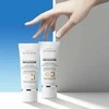 Institut Esthederm Institut Estherderm Photo Reverse rusvai gelsvas Medium apsauginis kremas nuo tamsių dėmių didelė apsauga nuo saulės 50ml
