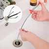 Spring-loaded flexible screw gripper long pawl
