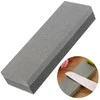 Double-sided whetstone sharpening scythe blades