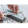 Double-sided whetstone sharpening scythe blades