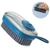 Cleaning brush with fluid dispenser