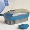 Cleaning brush with fluid dispenser