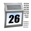 Izoxis Saulės energija maitinamas šviečiantis namo numeris