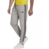Adidas Essentials Kelnės su siaurėjančiais rankogaliais ir 3 juostelėmis M GK8889