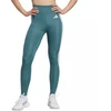 Adidas Optime Essentials Moteriški 7/8 leginsai su 3 juostelėmis, žali JY2152