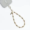 Dėklas Crong Phone Charm Modern Pearls telefono dirželis su perlais