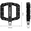 Juodi platforminiai dviračio pedalai Rockbros