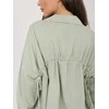 Khaki spalvos moteriški oversize marškiniai (vieno dydžio)
