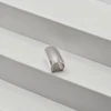 Kremzlės auskaras Capsule