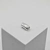 Kremzlės auskaras Capsule