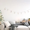 DecoKing Mediniai balti varpeliai, 10 vnt