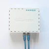 Mikrotik RB750GR3 gigabitinis eterneto maršrutizatorius, turkio ir baltos spalvos